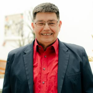 Martin Langer lächelt in die Kamera.